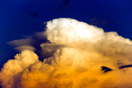 Puffy clouds at sunset above the Pacific ocean in Costa Rica