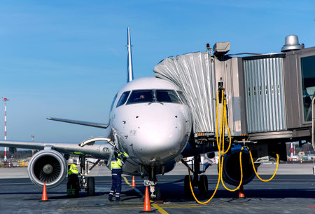 LATVIA, RIGA, MARCH, 13, 2015 - Passenger plane maintenance in airport before flight in Riga...