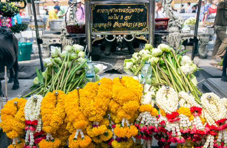 THAILAND, BANGKOK, MARCH, 18, 2015 - offerings of flowers in Wat Phra Kaew, also known as the Temple of the Emerald Buddha, Bangkok, Thailand.のeditorial素材
