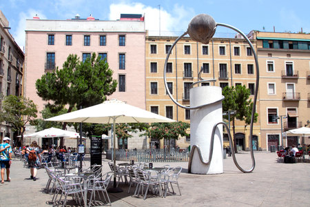 SPAIN, BARCELONA, JUNE, 27, 2015 - Small Art sculpture in the Gothic Quarter next to the summer cafe, Barcelona, Spainのeditorial素材