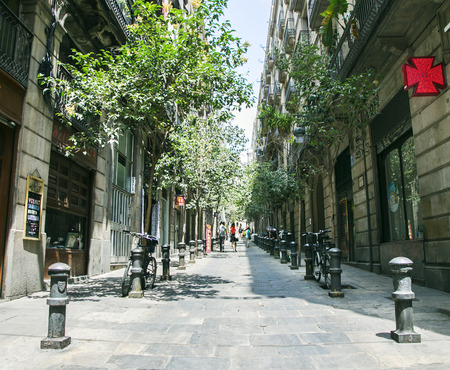 SPAIN, BARCELONA, JUNE, 27, 2015 - Narrow streets of the Gothic Quarter in Barcelona, Catalonia, Spain.のeditorial素材