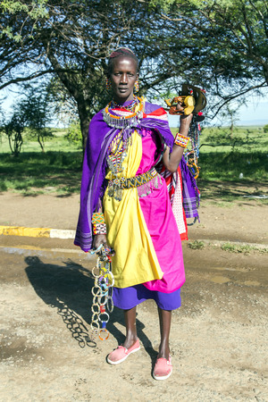 AFRICA, TANZANIA, MAY, 06, 2016 - African woman of the Masai tribe sells ornaments made of beads. The Maasai (also called Masai) are an indigenous African ethnic group of semi-nomadic people located in Kenya and northern Tanzania.のeditorial素材
