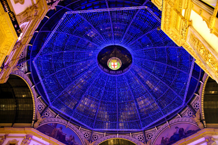 ITALY, MILAN, DESEMBER, 23, 2015 - Bottom view on the glass dome during Christmas in shopping mall the Galleria Vittorio Emanuele II, named after the first king of the Kingdom of Italy. Milan, Italyのeditorial素材
