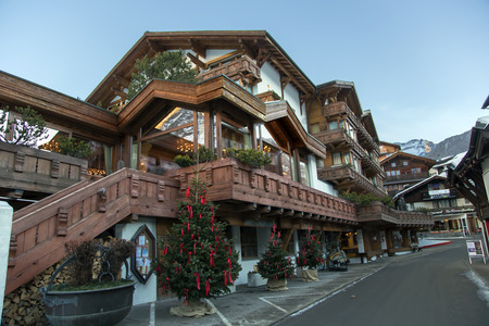 SWITZERLAND, SAAS-FEE, DECEMBER, 23, 2015 - The charming swiss resort of Saas Fee in the Ferienart Resort & Spa hotel before Christmas - one of the most innovative five-star wellness hotels in Switzerland.のeditorial素材