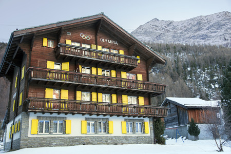 SWITZERLAND, SAAS-FEE, DECEMBER, 27, 2015 - Beautiful modern hotel OLYMPIA in the charming Swiss resort of Saas-Fee, Switzerlandのeditorial素材