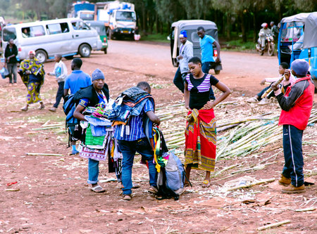 AFRICA, TANZANIA, MAY, 8, 2016 - Typical street market in Arusha: people buying things and products...