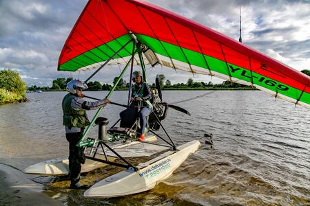 LATVIA, RIGA, 15, MARCH, 2016 - A young man hang gliderのeditorial素材