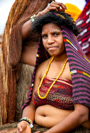 INDONESIA, PAPUA NEW GUINEA, WAMENA, IRIAN JAYA, AUGUST 20, 2018: Portrait of a papuans woman on...