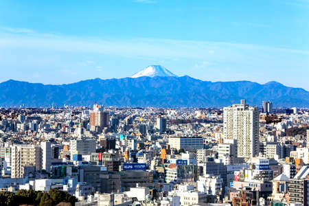 JAPAN, TOKIO, MAY, 2016 - Aerial view of Tokyo city overlooking Mount Fuji. Tokyo is the capital city of Japan.のeditorial素材