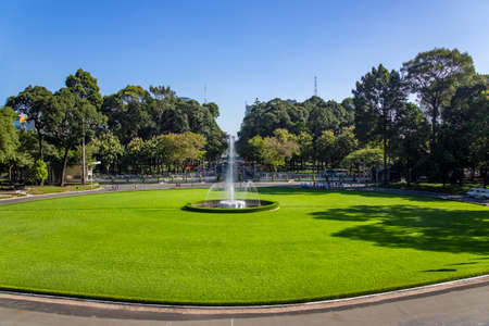 ASIA, VIETNAM, HOCHIMINH, NOVEMBER, 15, 2014 - Beautiful park with a fountain near Reunification Palace, also known as the Independence Palace in Hochiminh, Vietnam.のeditorial素材