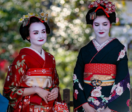 JAPAN, KYOTO, APRIL, 05, 2017 - Two nice womans in Maiko kimono dress in the old fashioned town of Kyoto Japan.のeditorial素材