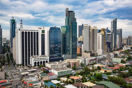 PHILIPPINES, MANILA, DECEMBER, 2019 - Modern multi-storey buildings in the business center of Manila, capital of the Philippinesのeditorial素材