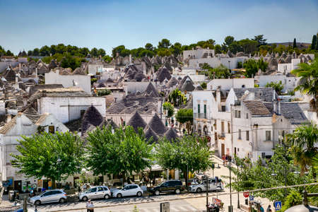 ITALY, ALBEROBELLO, AUGUST, 2014 - Trulli houses in Alberobello village, Italy. A trullo house is a traditional apulian dry stone hut with a conical roof.のeditorial素材