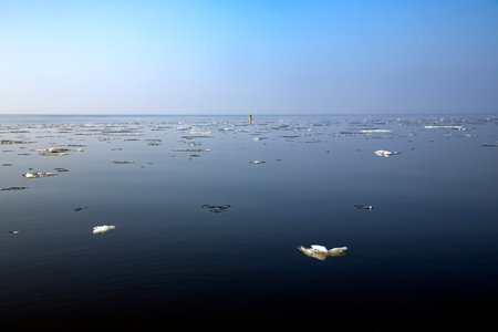 Panorama of winter Baltic Sea with snow and ice in Riga, Latvia. Baltics in winter.