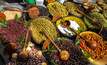 Assortment colorful organic olives at farmers street market stall in Avignon, France. Healthy Mediterranean cuisine.の写真素材