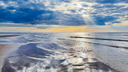 Panorama of the warm Gulf of Riga of the Baltic Sea against the background of cumulus clouds at...