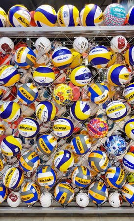 Latvia, Riga, July, 2021 - Shelves with colorful volleyball balls in the shopping mall in Riga, Latvia.のeditorial素材