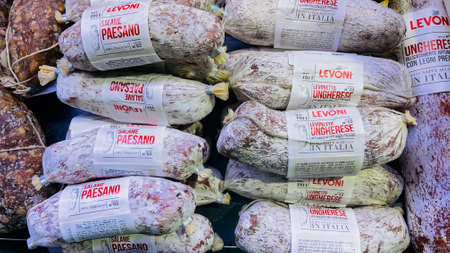 Latvia, Riga, July, 2021 - Traditional smoked Paesano italian salami in the shopping mall in Riga, Latvia.のeditorial素材
