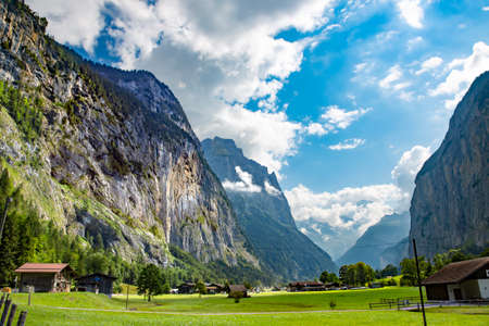 Natural landscape with small villages in the high mountains of Bernese Oberland, Switzerland.の写真素材