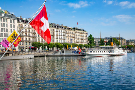SWITZERLAND, GENEVA, AUGUST, 2021 - Panorama of Lake Geneva with the vintage white pleasure steamer near the pier in Geneva, Switzerlandのeditorial素材