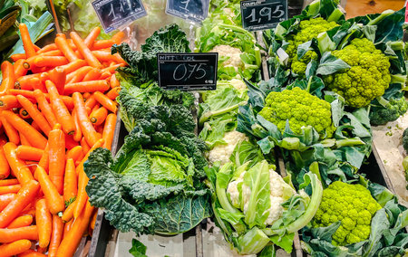 La Boqueria market with a variety of fresh greenery and vegetables in Barcelona, Spain. Spring...