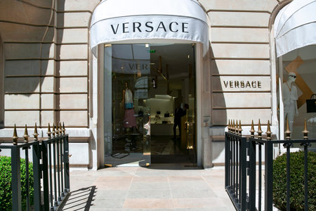 France, Paris, May, 2015 - Versace designer fashion store front entrance at Avenue des Champs -...