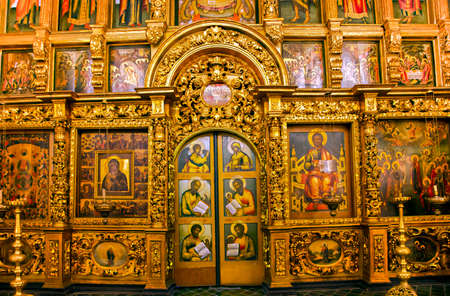 RUSSIA, MOSCOW, DECEMBER, 2021 - Stunning handmade gilded altar with icons and candlesticks near the iconostasis of Annunciation Orthodox Cathedral at Moscow Kremlin, Russiaのeditorial素材