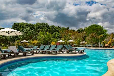 CENTRAL AMERICA, COSTA RICA, GOLFO DEL PAPAGAYO, MAY, 2014 - Recreation area with swimming pool in Hotel Occidental Grang Papagayo in Costa Rica, Central Americaのeditorial素材
