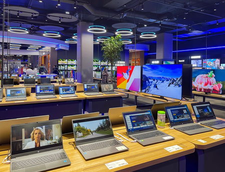 LATVIA, RIGA, MARCH, 2022 - Showroom of modern electronics  with new generation large TV-sets with...