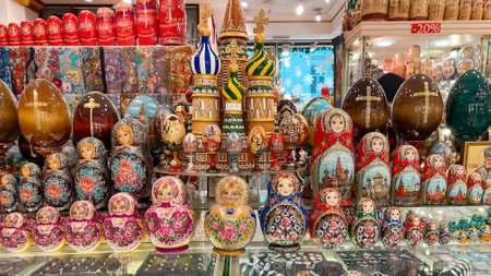 RUSSIA, MOSCOW, DECEMBER, 2022 - Gift shop with beautiful products: colorful nesting dolls, hand-painted palaces on Tverskaya street in Moscow. Matrioshka Nesting dolls are the most popular souvenirsのeditorial素材