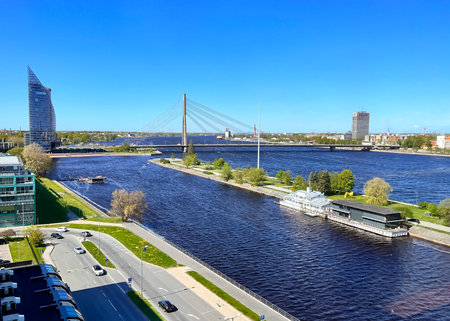 LATVIA, RIGA, MAY, 2022: Beautiful aerial view of the Daugava river bank in Riga, Latvia