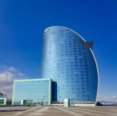SPAIN, BARCELONA, MARCH, 2022: Panoramic view of W Barcelona Hotel in Barcelona, Spain. Popularly known by locals as Hotel Vela, Sail Hotel in Catalan and Spanish, because of its sail shapeのeditorial素材