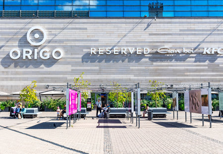 LATVIA, RIGA, AUGUST, 2022: The modern building of the Origo shopping center near the Riga Central Railway Station in Riga, capital of Latviaのeditorial素材