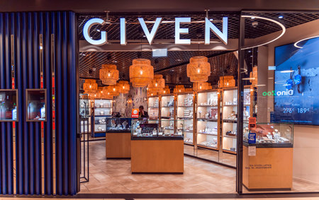 LATVIA, RIGA, AUGUST, 2022: Interior of new modern GIVEN jewelry store with interesting wicker lampshades in shopping mall, Riga, Latviaのeditorial素材