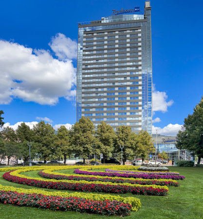 LATVIA, RIGA, AUGUST, 2022: Panoramic view of Modern multi-storey building of the Radisson Blu hotel in Riga, capital of Latvia. EU.のeditorial素材