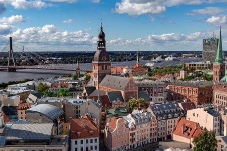 LATVIA, RIGA, SEPTEMBER, 2022: Aerial view from Saint Peters church on Riga Old Town overlooking the Dome Cathedral and the Vansu bridge across the Daugava River, Latvia. EU.のeditorial素材