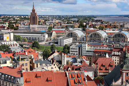 LATVIA, RIGA, SEPTEMBER, 2022: Aerial view of Riga Old Town and Riga Central market near Daugava river from Saint Peters church. Latvia. EUのeditorial素材