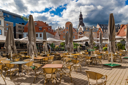 LATVIA, RIGA, SEPTEMBER, 2022 - Panorama streets of the Riga Old Town with open-air cafes on Dome Square in Riga, capital of Latviaのeditorial素材