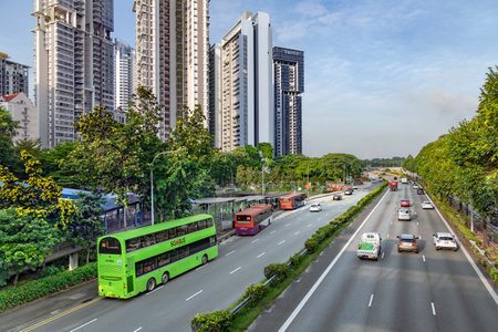 Southeast Asia, Singapore, November, 2022: Urban infrastructure with multi-lane highway with traffic and  large landscaping in the Singapore city.のeditorial素材