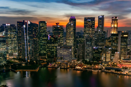 Southeast Asia, Singapore, November, 2022: Aerial view of Singapore city business skyscrapers and financial district with evening illumination on sunsetのeditorial素材