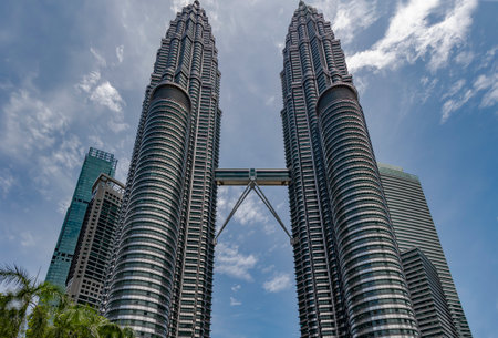 Malaysia, Kuala Lumpur, November, 2022: The Petronas Towers, also known as the Petronas Twin Towers are twin skyscrapers in Kuala Lumpur, Malaysia. The towers are the tallest twinのeditorial素材