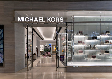 MALAYSIA, KUALA LUMPUR, NOVEMBER, 2022: External view of the Michael Kors brand store in Pavilion shopping mall, Kuala Lumpur. Malaysiaのeditorial素材