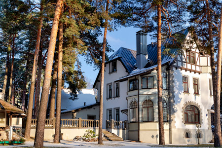 LATVIA, RIGA, DECEMBER, 2022: Private cottage four-storey of ancient architecture in the Mezaparks district, quiet and forest area of Riga, capital of Latviaのeditorial素材