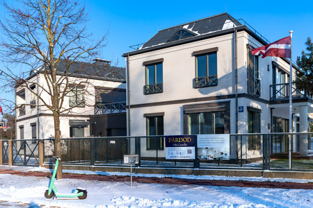 LATVIA, RIGA, DECEMBER, 2022: New modern two-storey cottages for sale in the Mezaparks district, Riga. Latvia. View of newly built cottages.のeditorial素材
