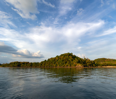 Small forested islands in the quiet Andaman Sea in Thailand. The beauty of a clean environment in Asia.の写真素材