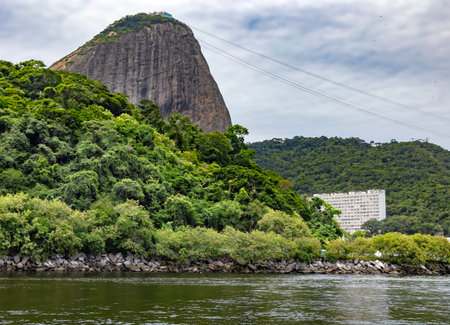 Sugar Loaf Mountain - Pao de Acucar with cable car and the bay at Atlantic Ocean In Rio de Janeiro....