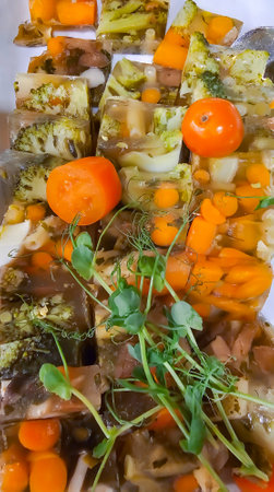 Jellied broccoli and young carrots - one of the favorite dishes of Polish cuisine. Healthy food concept.の写真素材