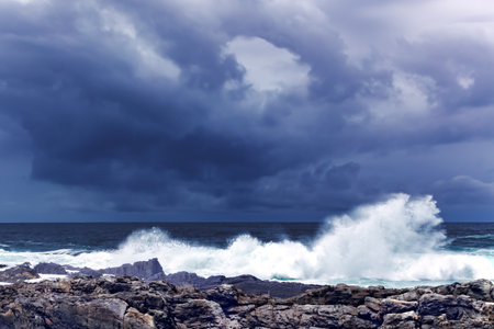 Large Indian Ocean waves and rocky coastline in Tsitsikamma, Garden Route National Park, Eastern Cape. South Africaの写真素材