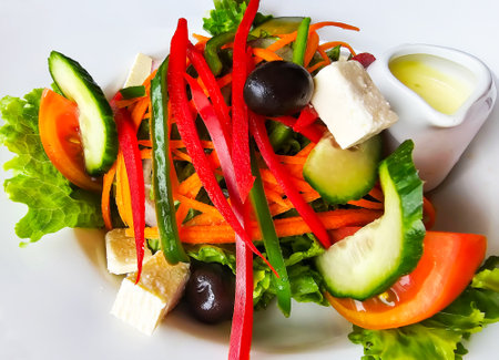 Greek salad of fresh vegetables with feta cheese close-up. Healthy eating concept.の写真素材