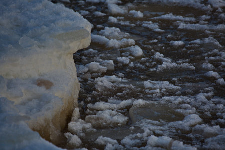 Freezing water of the northern lake Onega.